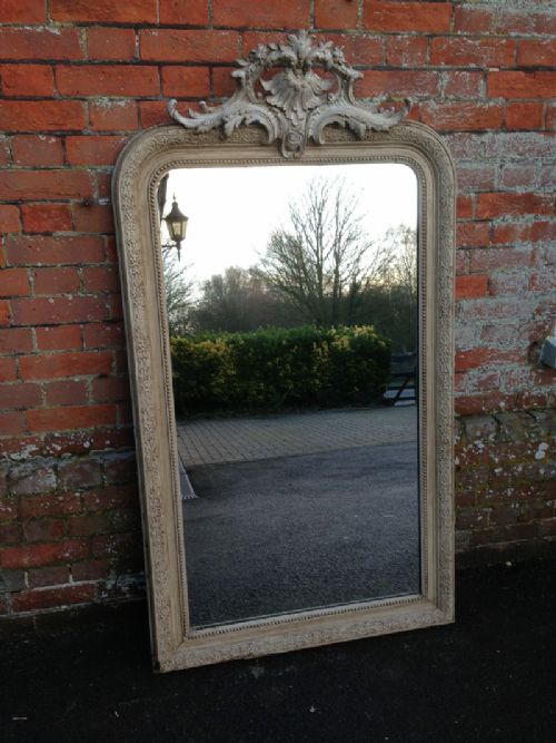A Highly Decorative 19th Century French Carved Wo and Gesso Painted Mirror.