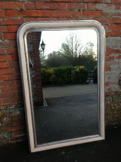 An Unusual Antique Large Decorative Arched Top Cream and Silvered Frame Mirror.
