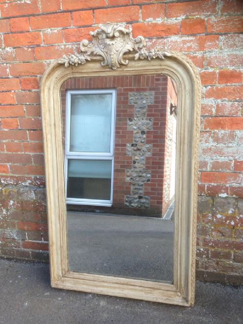 A Highly Decorative Antqiue 19th Century French Carved Wood and Gesso Mirror with Arched Shaped Top.
