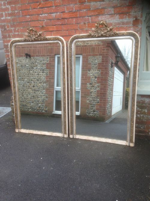 An Absolutely Stunning and Highly Unusual Pair of Large Antique 19th Century French Carved Wood and Gesso Silver Cream and Gilt Arched Top Mirrors.