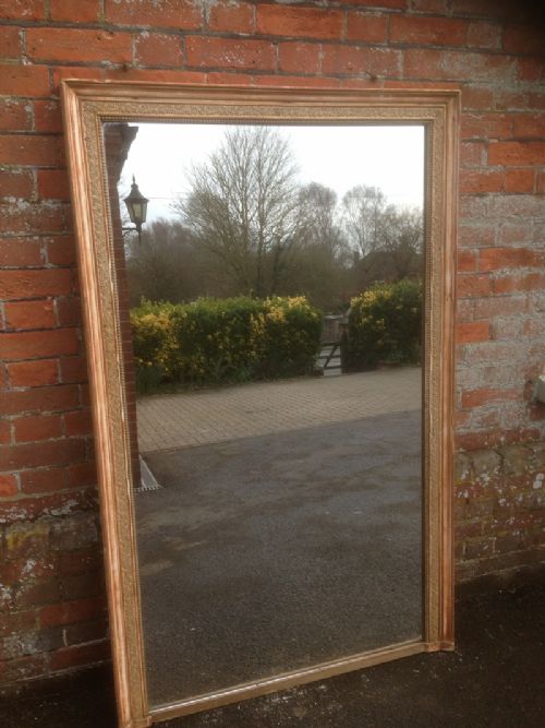 A Highly Useful 19th Century Large French Gilt Wall Mirror.