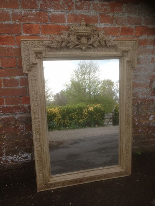 A Useful Size Antique 19th Century French Carved Wood and Gesso Painted Mirror with Ornate Crest.