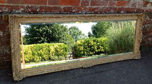A Good Size Large Antique 19th Century English Carved Wood Gilt and Cream Mirror.