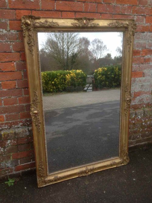 A Large Early Antique 19th Century French Carved Wood and Gesso Original Gilt Louis Phillippe Mirror.