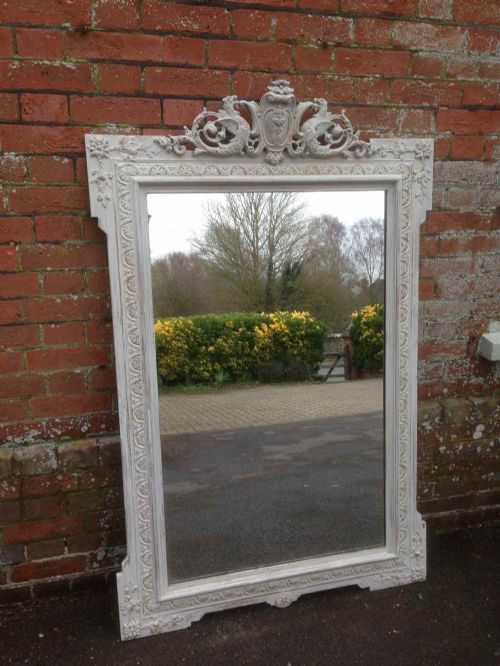 A Large Antique 19th Century French Carved Wood and Gesso Distressed Painted Mirror.