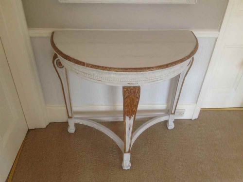 A Stunning Highly Decorative Carved Wood Painted French Demi Lune Console Table.