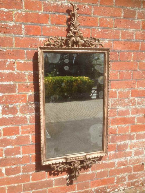 An Original Early 19th Century French Distressed Silvered and Painted Ribbed Framed Mirror.