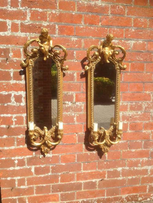 An Exceptional Pair of English Antique 19th Century Gilt Girandole Wall Mirrors.