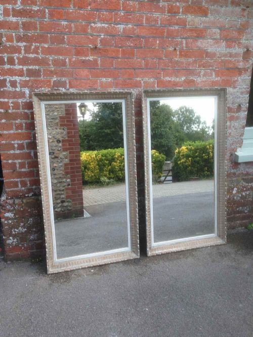 A Pair of Early 20th Century Carved Wood Painted Ribbed Mirrors.
