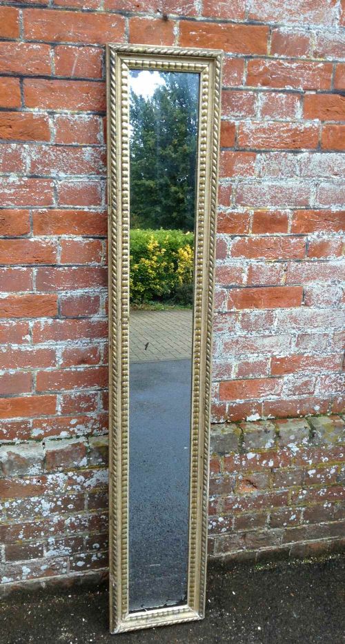 A Highly Useful Antique 19th Century French Original Silvered Ribbed Narrow Mirror.