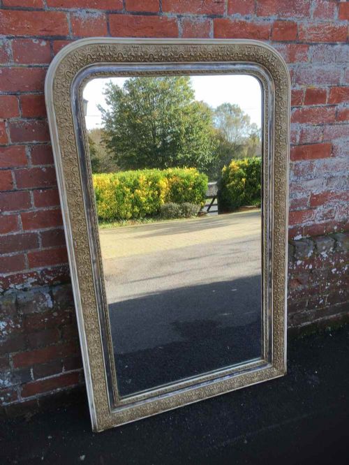 A Good Size Antique 19th Century French Carved Wood and Gesso Arched Top Original Silvered Cream and Gilt Mirror.