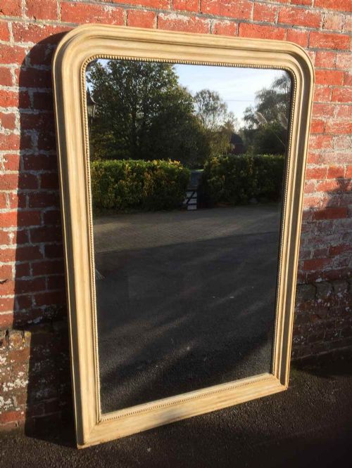 A Large Plain Antique 19th Century French Arched Top Carved Wood and Gesso Painted Mirror.