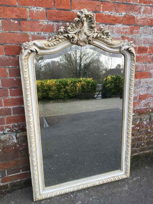 A Stunning Antique 19th Century French Carved Wood & Gesso Shaped Top Painted Mirror.
