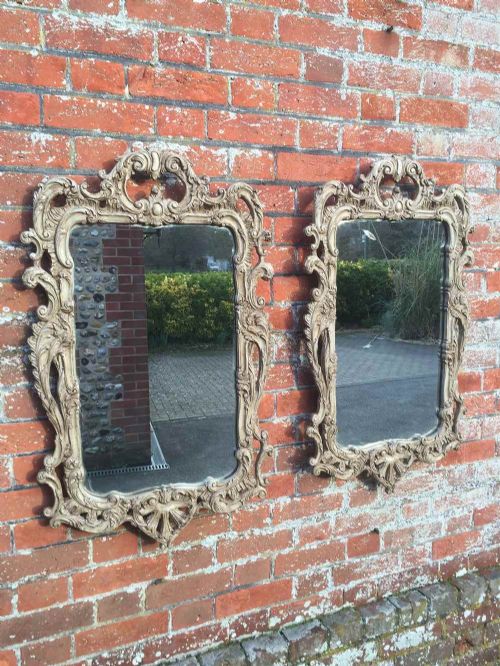 A Very Decorative Pair of Early 20th Century French Rococco Style Painted Mirrors.
