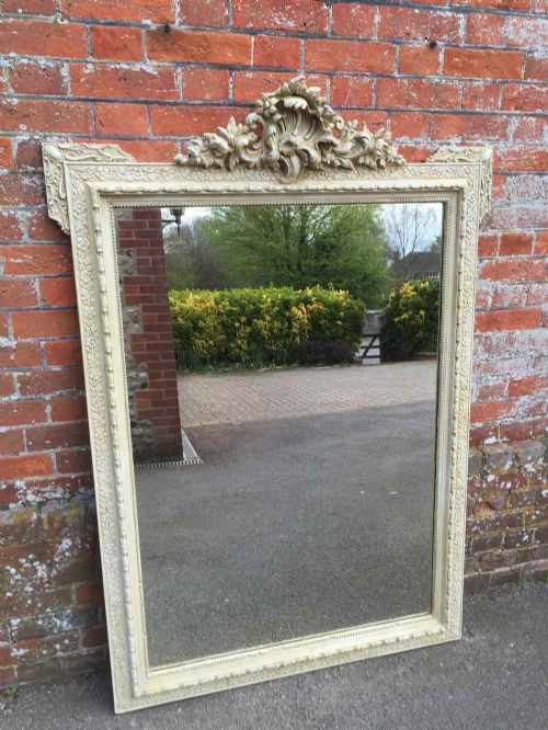 A Highly Decorative Large Antique 19th Century French Carved Wood and Gesso Painted Cream Mirror.
