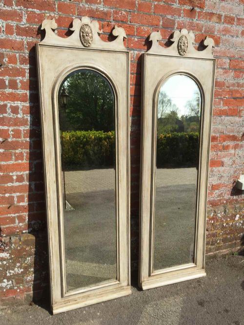 An Unusual Large Pair of Antique 19th Century French Carved Wood Painted Arched Pier Mirrors.