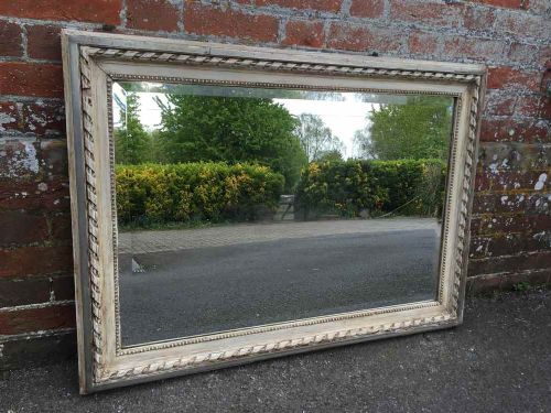 A Stunning Antique 19th Century French Rope Twist Cream and Silvered Framed Mirror.