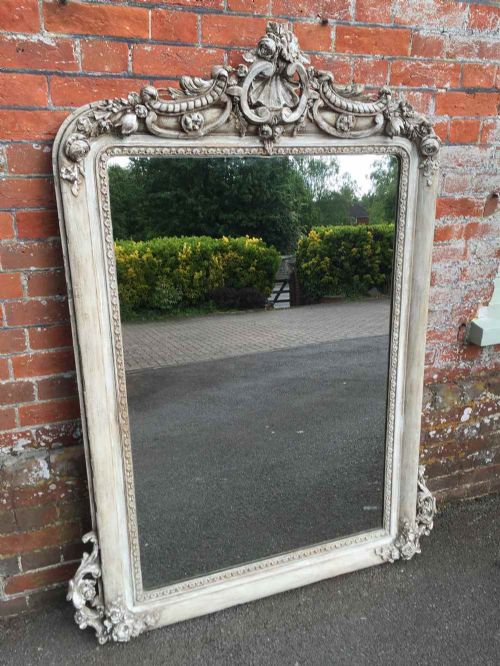 A Stunning Large Antique 19th Century Carved Wood and Gesso Painted Highly Decorative Mirror.