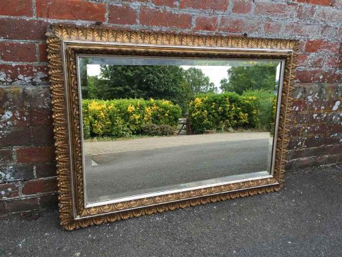 A Very Useful Antique Italian 19th Century Original Distressed Carved Wood, Silver, and Gilt Mirror.