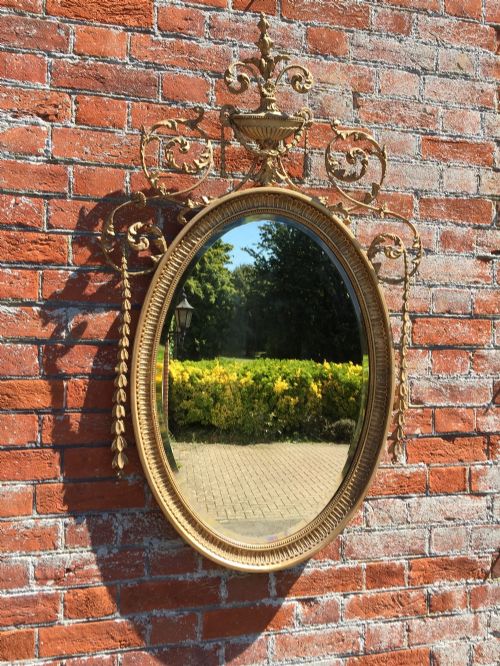 A Fabulous Good Size Antique 19th Century English Carved Wood and Gesso Original Gilt Oval Sheraton Mirror.