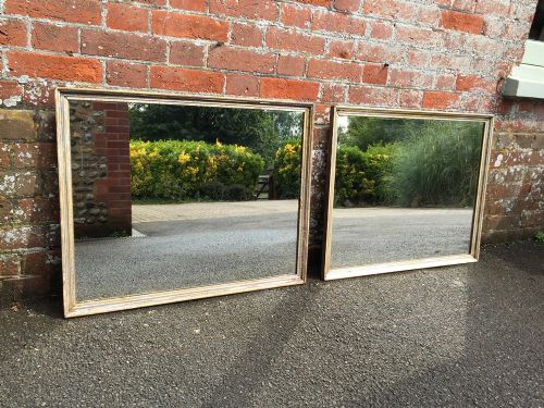 A Fabulous Pair of Carved Wood and Original Silvered Bistro Mirrors.