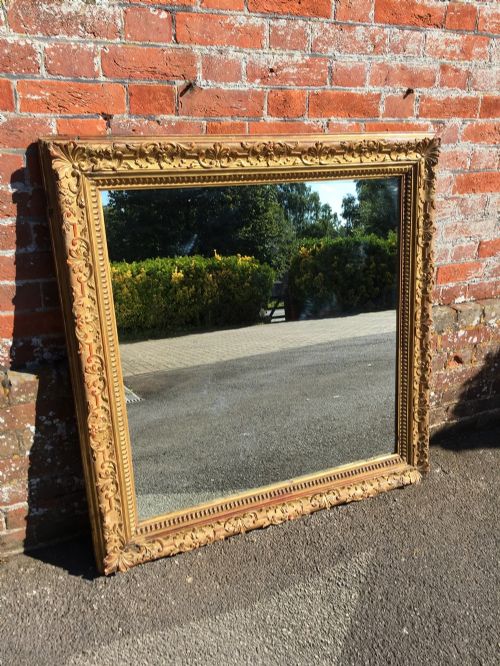 A Fabulous Useful Size Antique Carved Wood and Gesso Original Gilt Mirror.