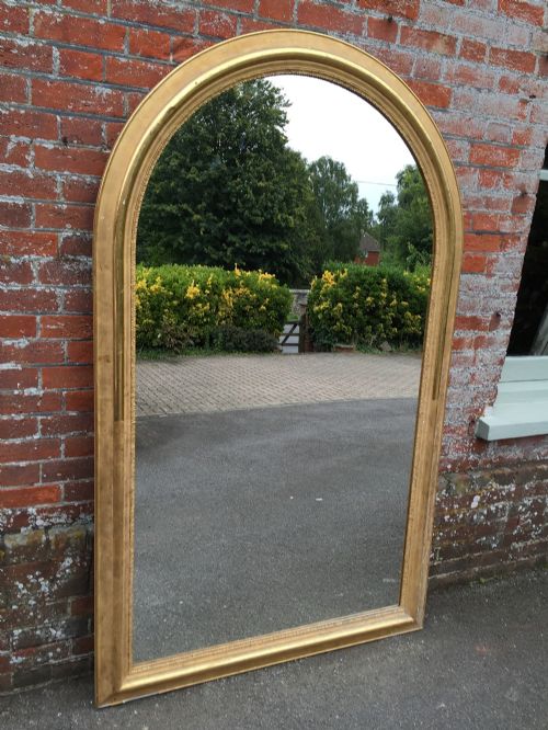 A Wonderful Highly Unusual Large Antique 19th Century French Carved Wood and Gesso Original Gilt Arched Mirror.