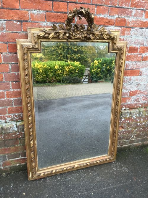 A Large Shaped Top Antique 19th Century French Original Carved Wood and Gesso Gilt Mirror.