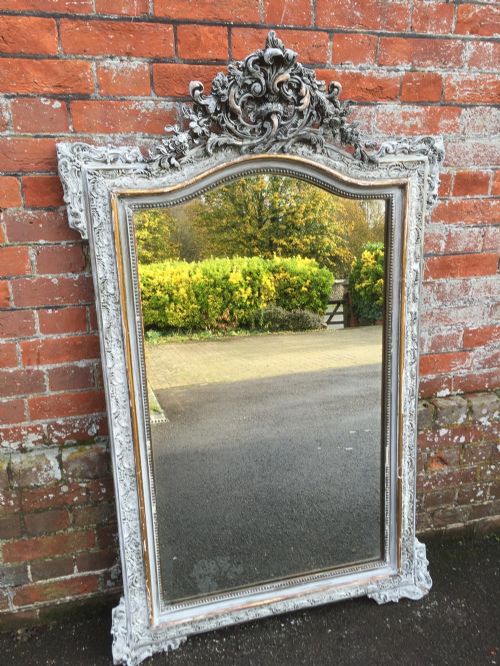 A Highly Decorative Large Antique 19th Century French Carved Wood and Gesso Distressed Painted Mirror.