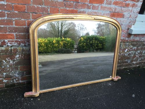 A Highly Useful Antique 19th Century English Carved Wood and Original Gilt Plain Shaped Overmantel  Mirror.