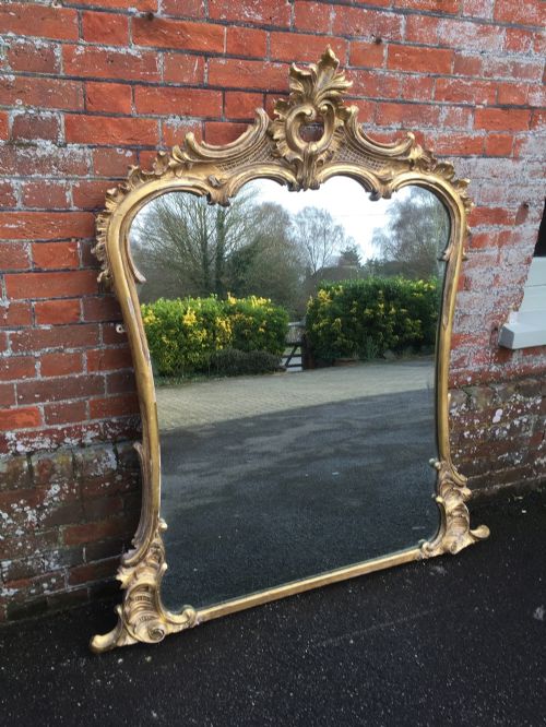 A Fabulous Large Antique 19th Century English Carved Wood Original Distressed Gilt Shaped Top Overmantel Mirror.