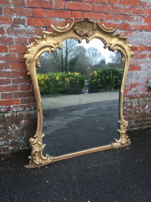 A Wonderful Large Antique 19th Century English Carved Wood Original Gilt Shaped Overmantel Mirror.