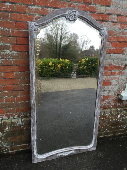 A Highly Decorative Large Early Antique 19th Century French Carved Wood Distressed Painted Shaped Top Mirror.