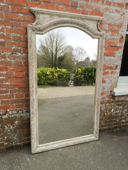 A Fabulous Large Antique 19th Century French Carved Wood and Gesso Distressed Painted Shaped Top Mirror.