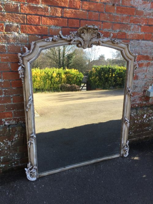A Delightful Large Antique 19th Century French Highly Decorative Carved Wood and Gesso Painted Shaped Top Mirror.
