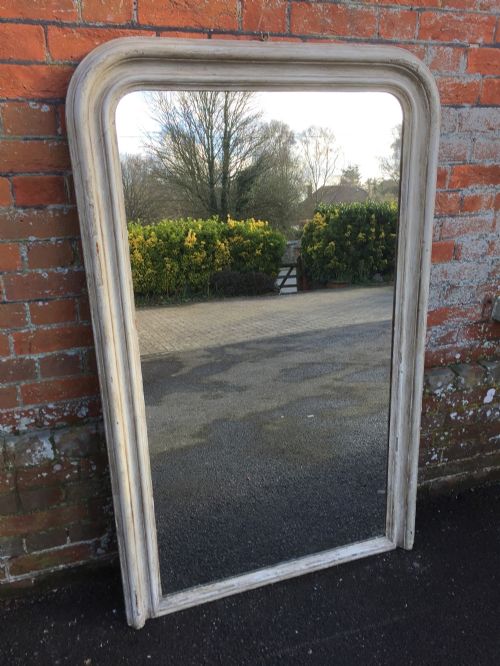 A Large Antique 19th Century French Carved Wood and Gesso Painted Arched Top Louis Philippe Mirror.