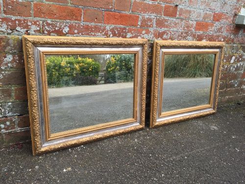 An Unusual Pair of Antique 19th Century English Carved Wood Silver Gilt Mirrors.