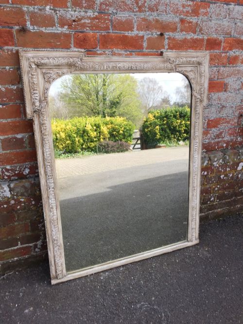 A Highly Useful Antique 19th Century French Carved Wood and Gesso Painted Overmantel Mirror.
