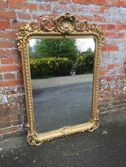 A Stunning Antique 19th Century French Carved Wood & Gesso Original Gilt Shaped Mirror.
