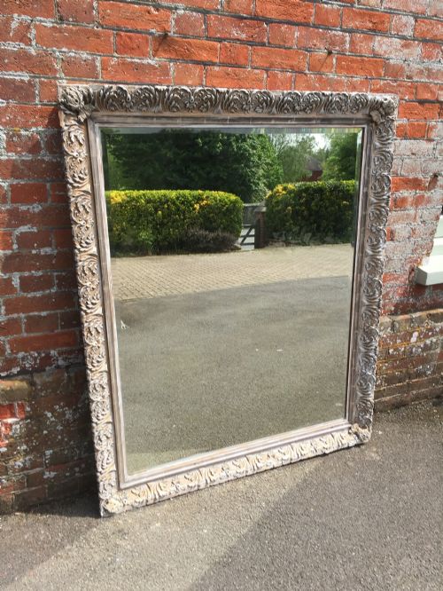 A Stunning Large Antique 19th Century Italian Carved Wood and Gesso Distressed Painted Gilt and Silvered Framed Mirror.