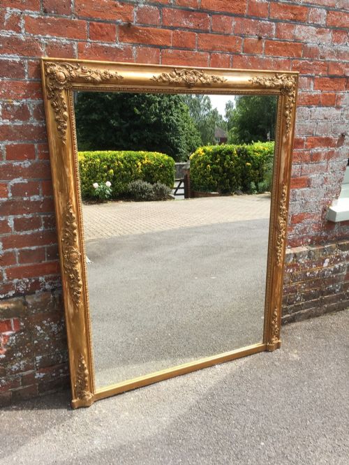 An Absolutely Stunning Large Antique 19th Century French Carved Wood and Gesso Original Gilt Shaped Top Mirror.