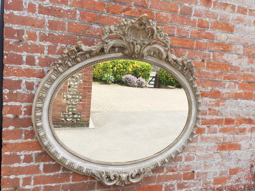 A Wonderful Antique 19th Century French Carved Wood and Gesso Oval Painted Mirror.