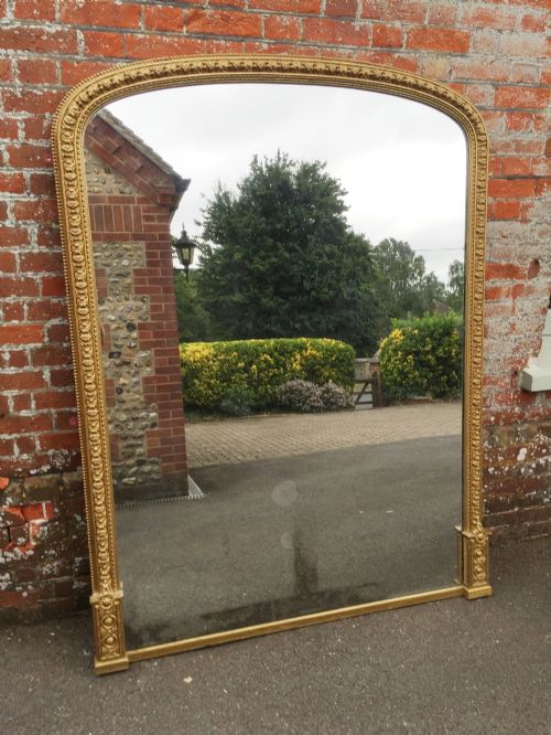 An Exceptional Large Antique 19th Century English Original Carved Wood and Gesso Gilt Arched Mirror.