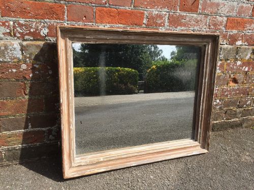 A Highly Distressed Antique 19th Century French Carved Wood Distressed Painted Mirror.