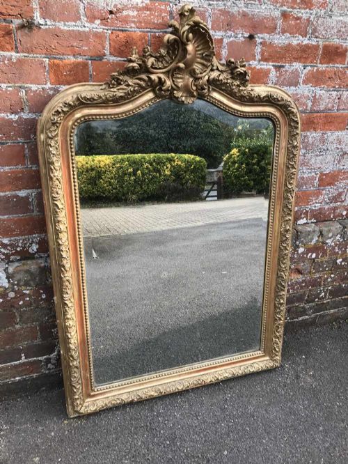 A Wonderful Good Size Antique 19th Century French Carved Wood and Gesso Original Shaped Top Gilt Distressed Mirror.