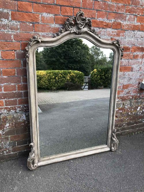 A Wonderful Large Antique 19th Century French Carved Wood and Gesso Shaped Top Painted Mirror.