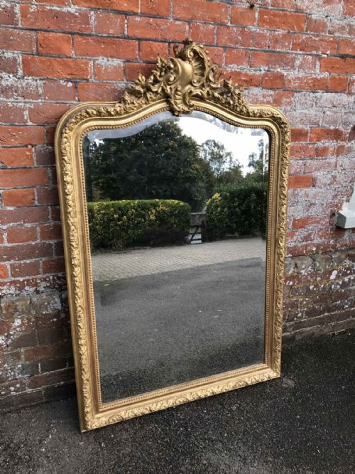 A Stunning Large Antique 19th Century French Carved Wood and Gesso Original Gilt Shaped Top Mirror.