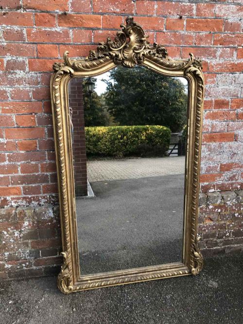 A Fabulous Large Antique 19th Century French Carved Wood and Gesso Original Gilt Shaped Top Mirror.
