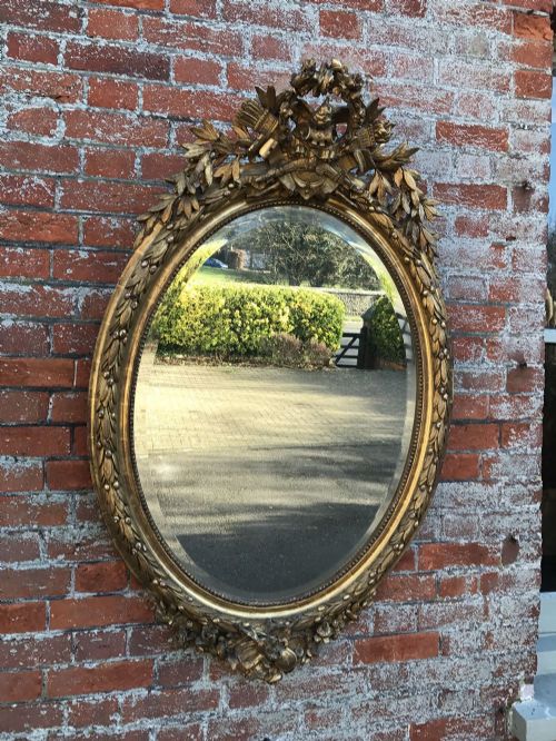 An Exquisite Antique 19th Century French Carved Wood & Gesso Original Gilt Oval Mirror.