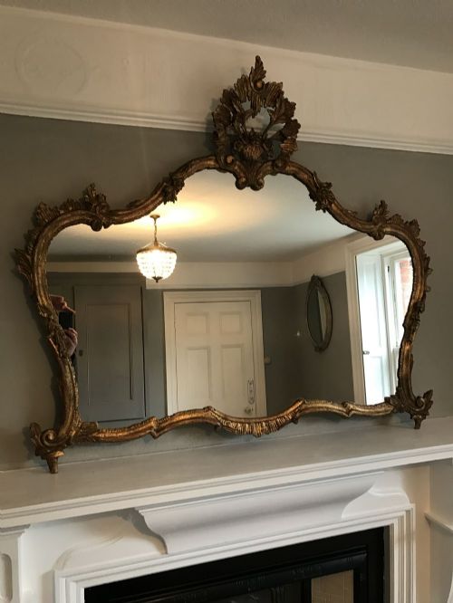 A Delightful Early 20th Century French Carved Wood Original Gilt Decorative Shaped Mirror.